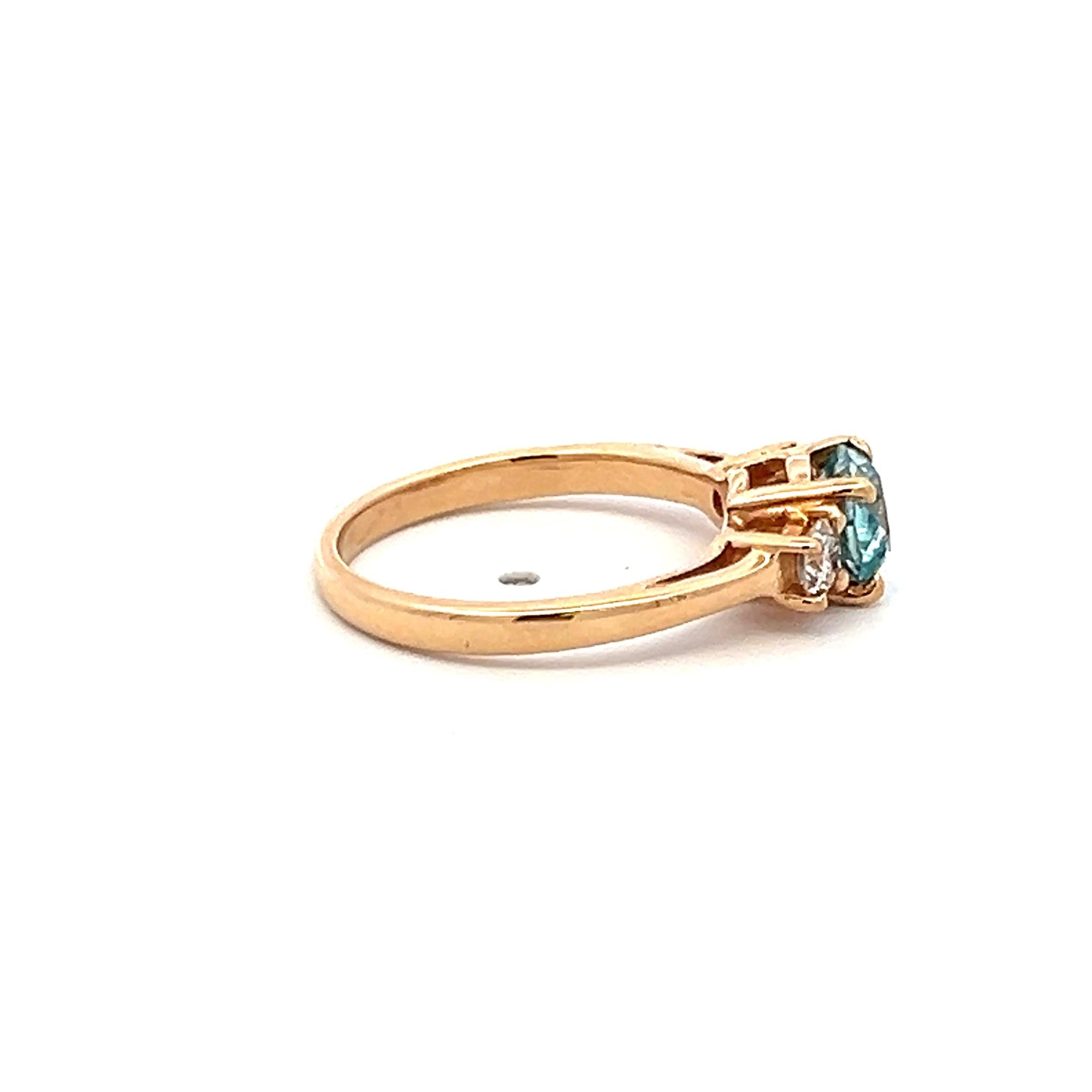 0.50 Carat Blue Zicron 0.20 Carat Round Diamond 14K YG Three-Stone Ring