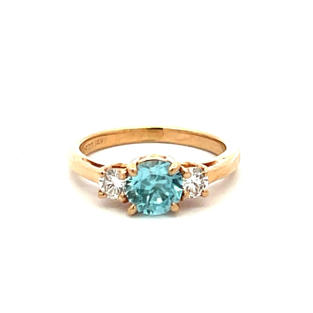 0.50 Carat Blue Zicron 0.20 Carat Round Diamond 14K YG Three-Stone Ring