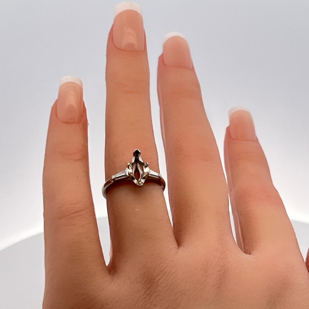 0.14 Carat Tapered Baguette Shape Diamond 14 Karat White Gold Semi Mount Ring