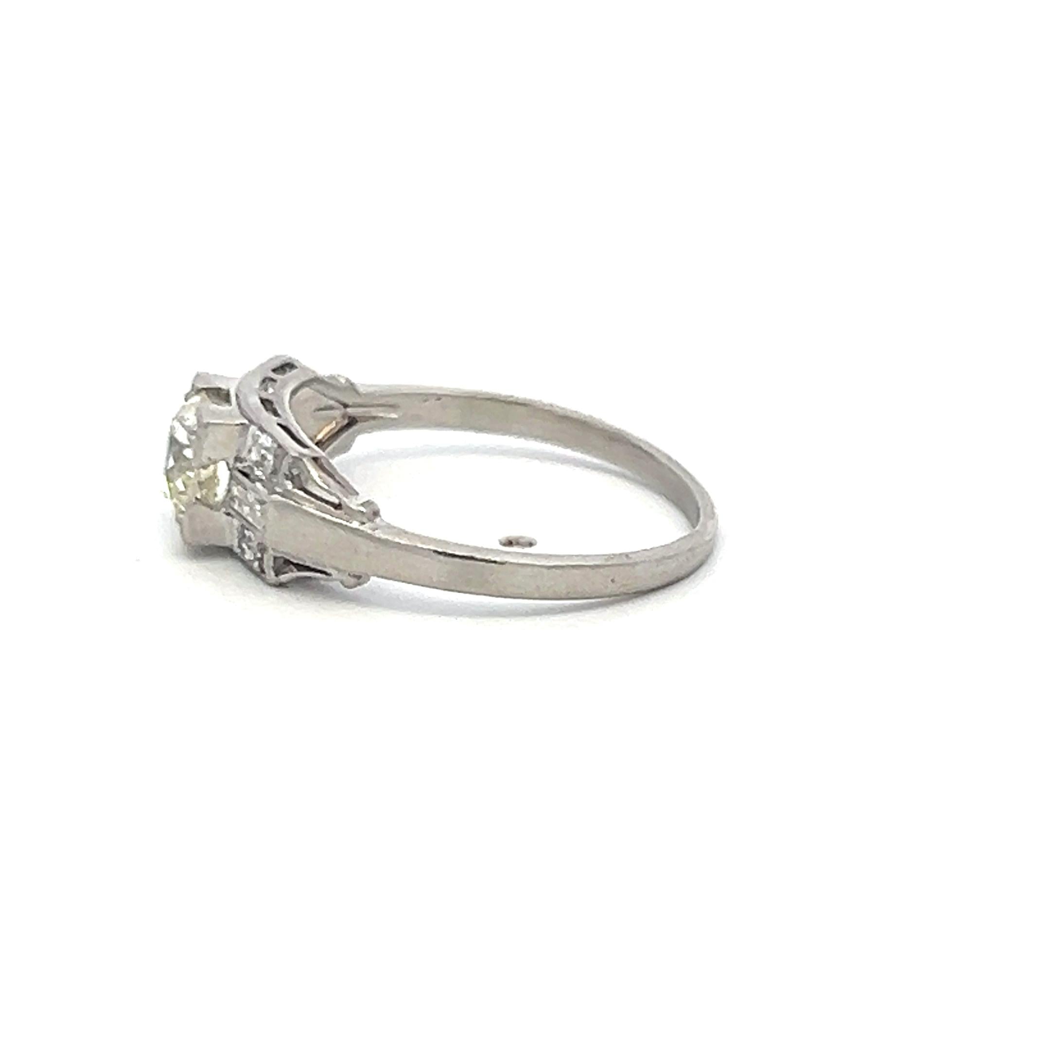 0.78 Carat Old European and Baguette Diamond Platinum Art Deco Ring