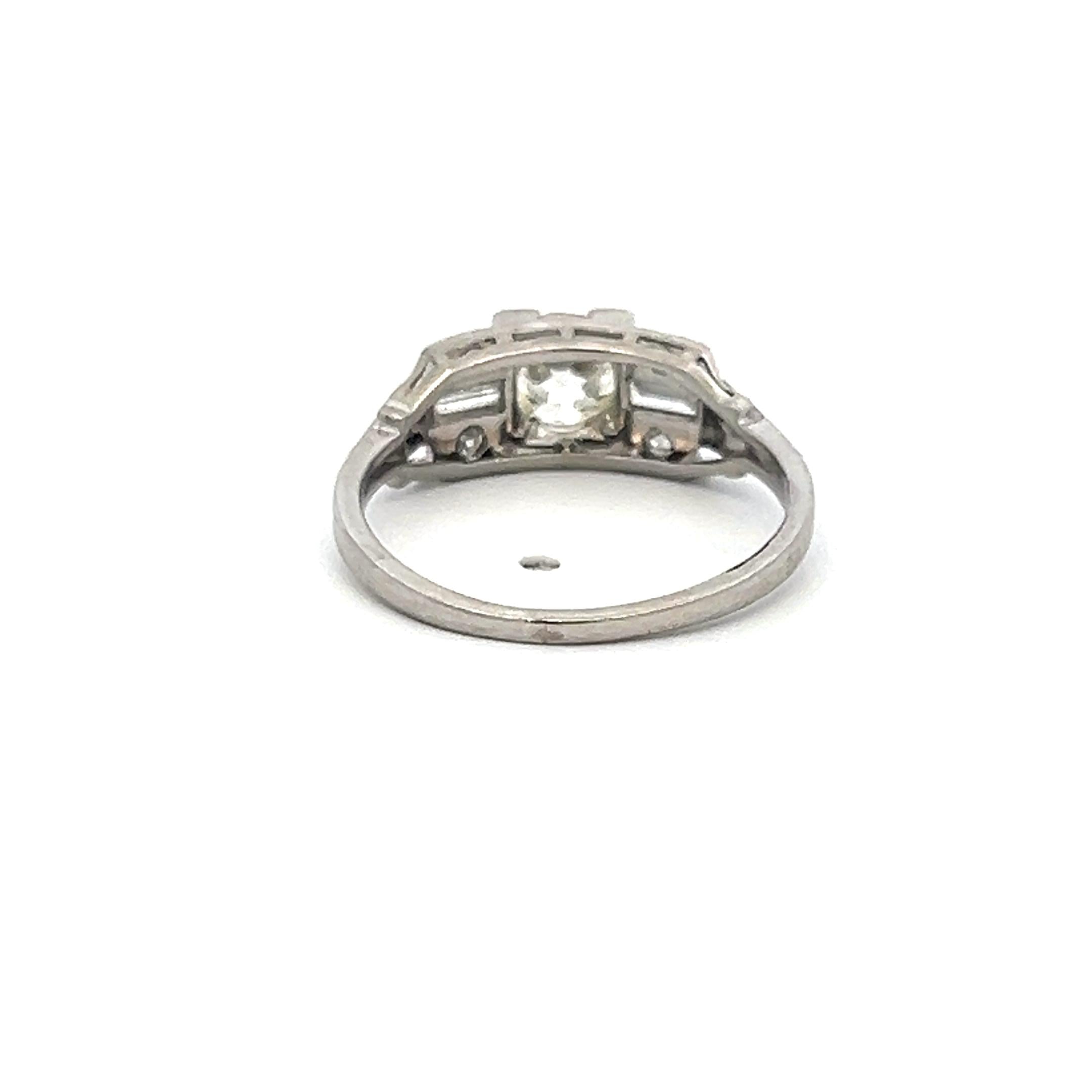 0.78 Carat Old European and Baguette Diamond Platinum Art Deco Ring