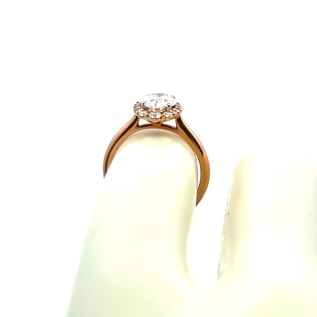 1.22 Carat Oval Lab-Grown Diamond 0.24 Carat Round Diamond 14K Rose Gold Ring