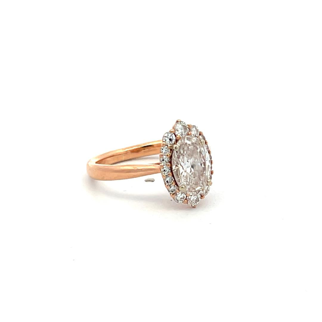 1.22 Carat Oval Lab-Grown Diamond 0.24 Carat Round Diamond 14K Rose Gold Ring