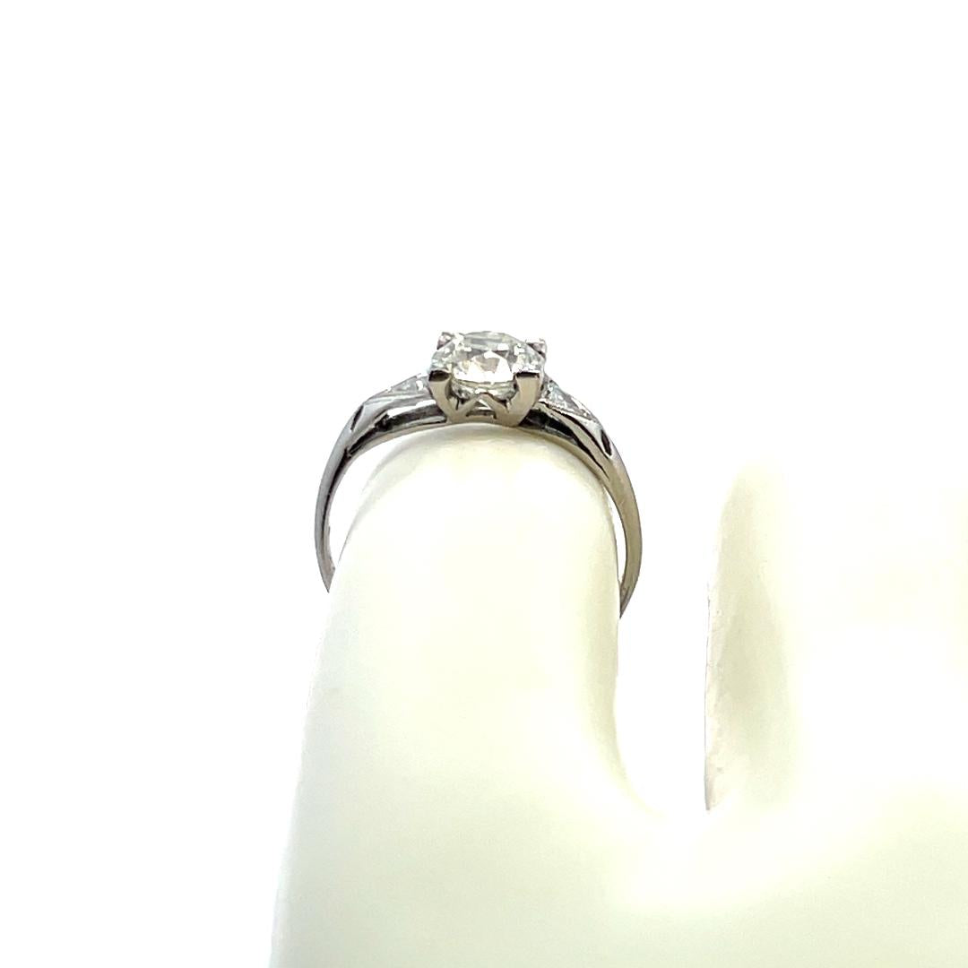 1.21 Carat Old European Cut and Triangular Diamond Platinum Engagement Ring