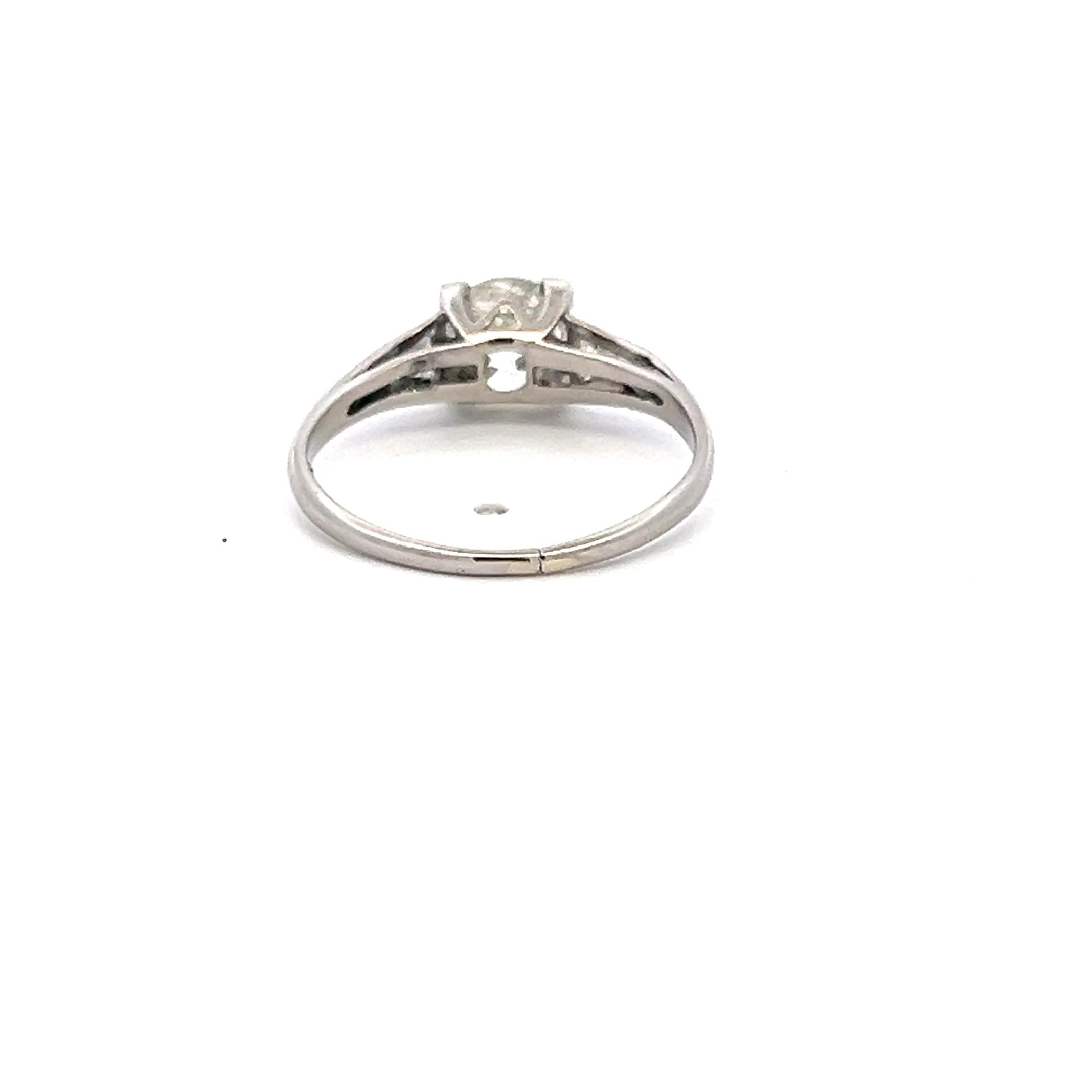 1.21 Carat Old European Cut and Triangular Diamond Platinum Engagement Ring