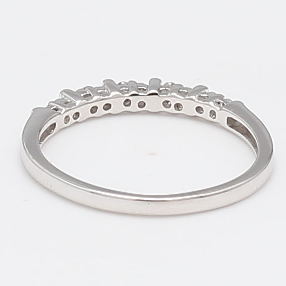 0.10 Carat Round Brilliant I I1 Diamond 14 Karat White Gold Band Ring