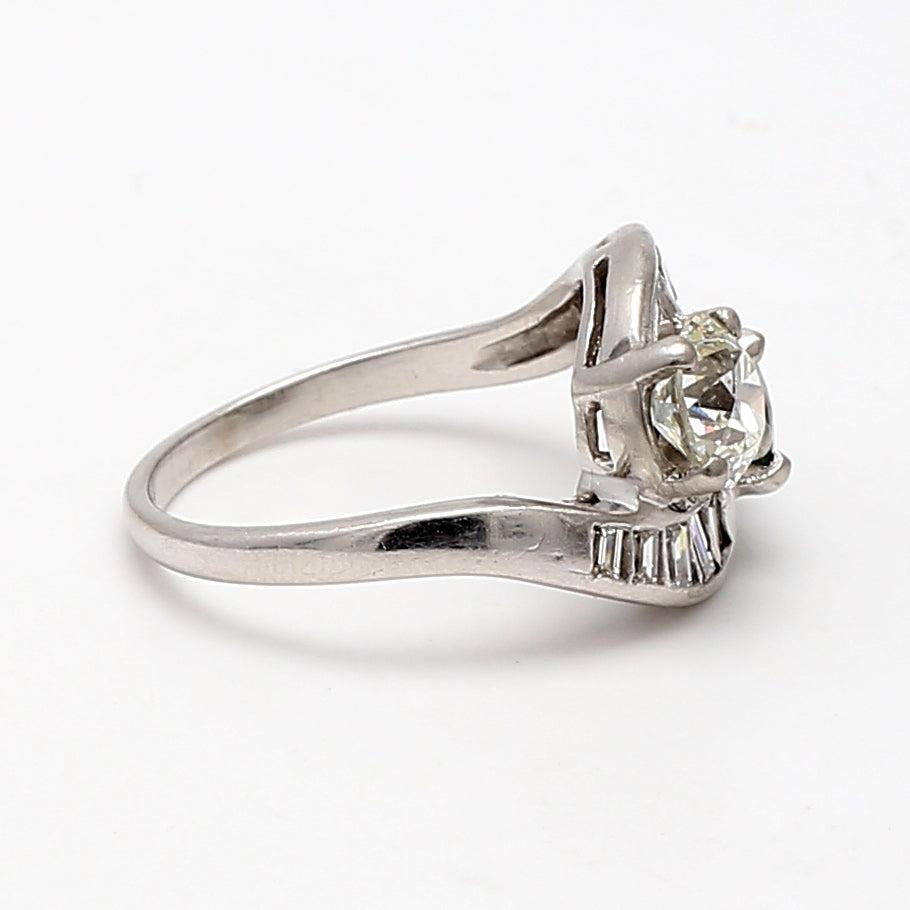 1.10 Carat Circular Brilliant Cut J SI1 Diamond and Sapphire Platinum Two-Stone