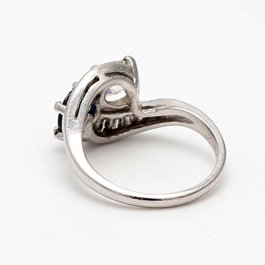 1.10 Carat Circular Brilliant Cut J SI1 Diamond and Sapphire Platinum Two-Stone