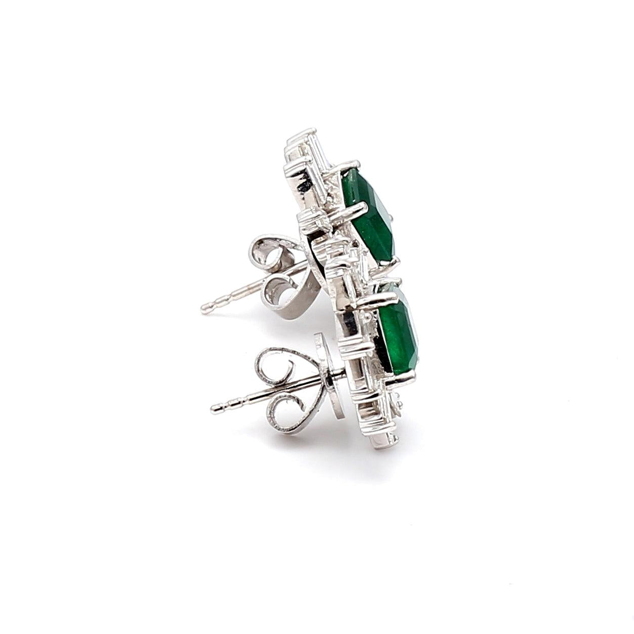 2.50 Carat Emerald 1.50 Carat Tapered BaguetteG VS1 Diamond 14 Karat White Gold