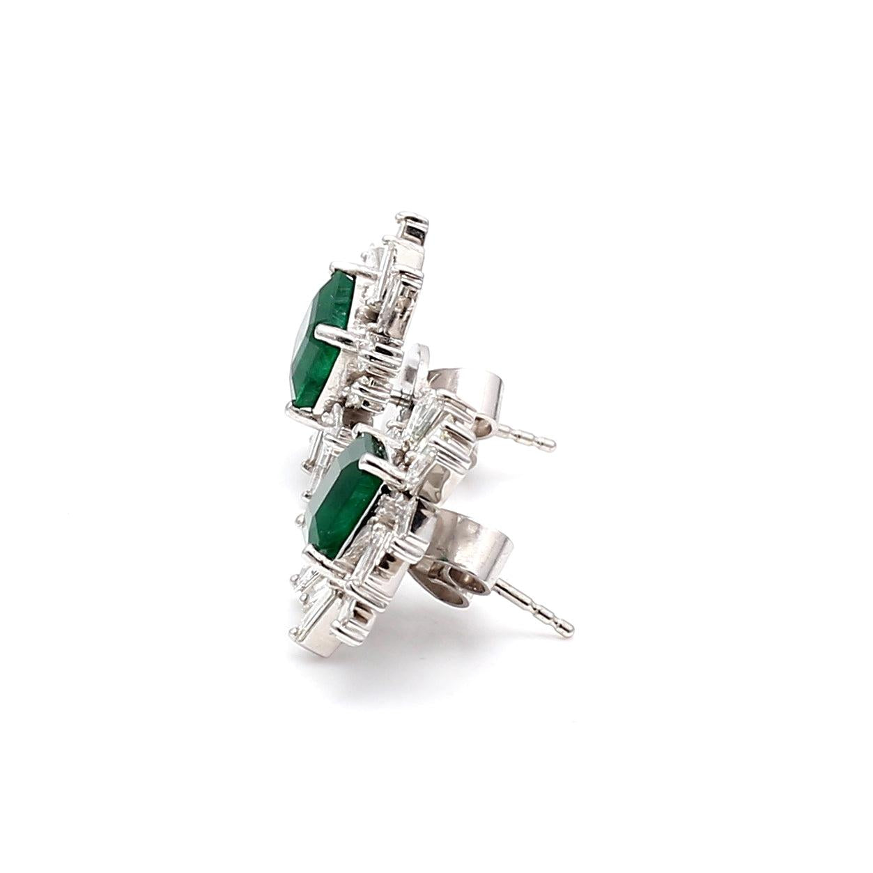 2.50 Carat Emerald 1.50 Carat Tapered BaguetteG VS1 Diamond 14 Karat White Gold