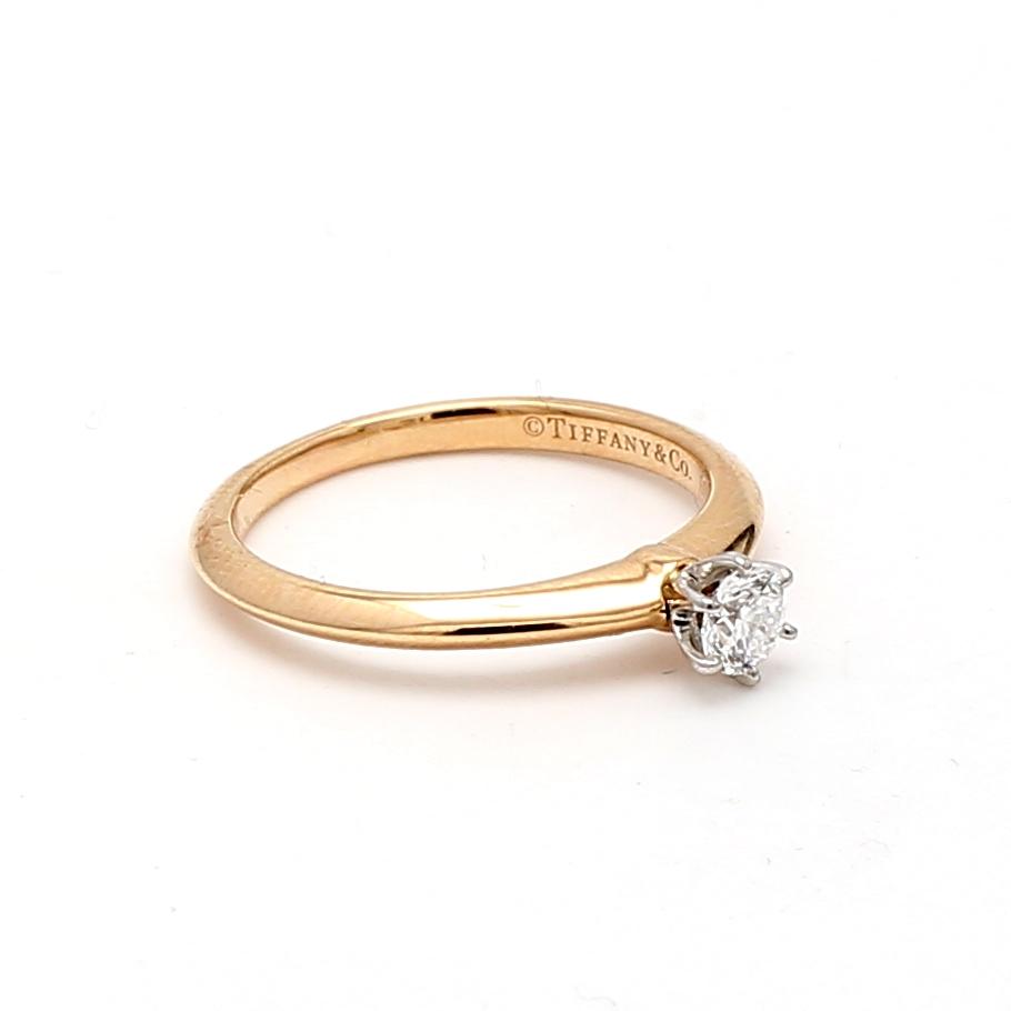 Tiffany & Co 18K YG Solitaire Ring with 0.18 Carat Round F VS1 Diamond Size 5