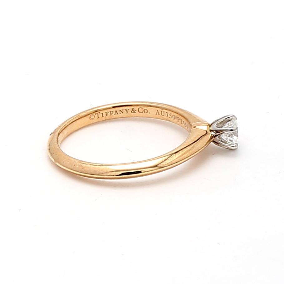 Tiffany & Co 18K YG Solitaire Ring with 0.18 Carat Round F VS1 Diamond Size 5