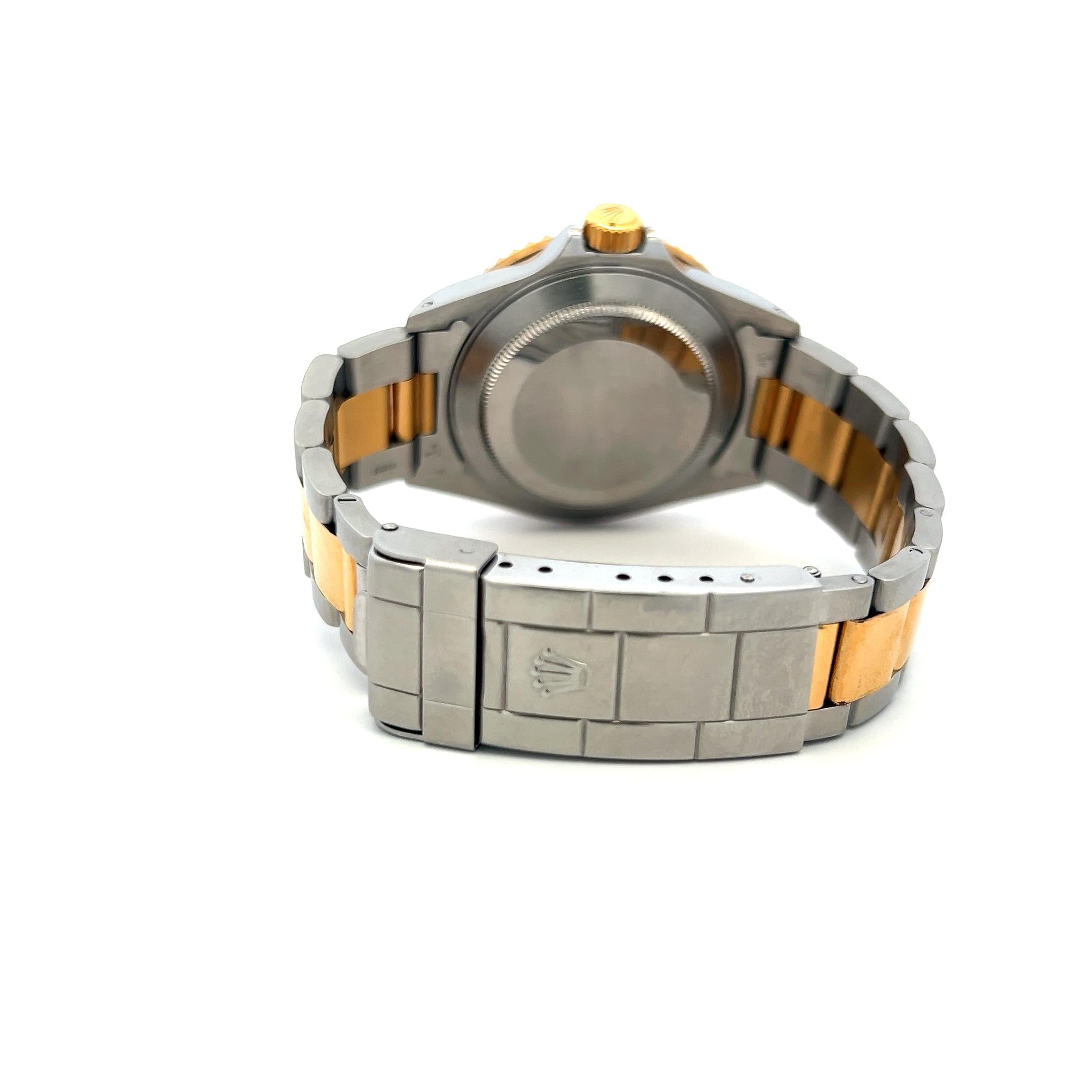Rolex Submariner 18K Gold Steel Blue Dial Reference 16613 Box and Paper