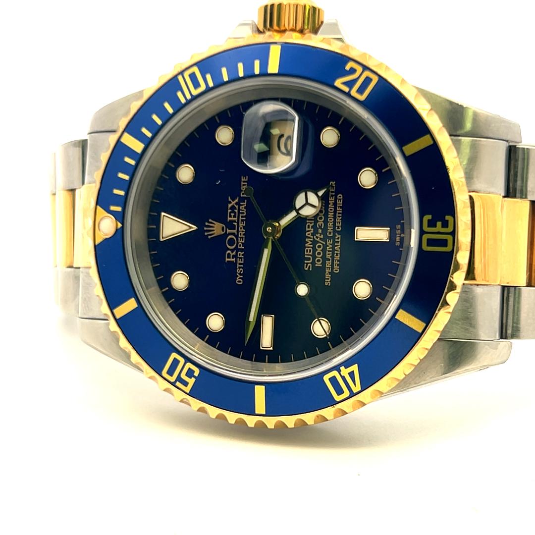 Rolex Submariner 18K Gold Steel Blue Dial Reference 16613 Box and Paper