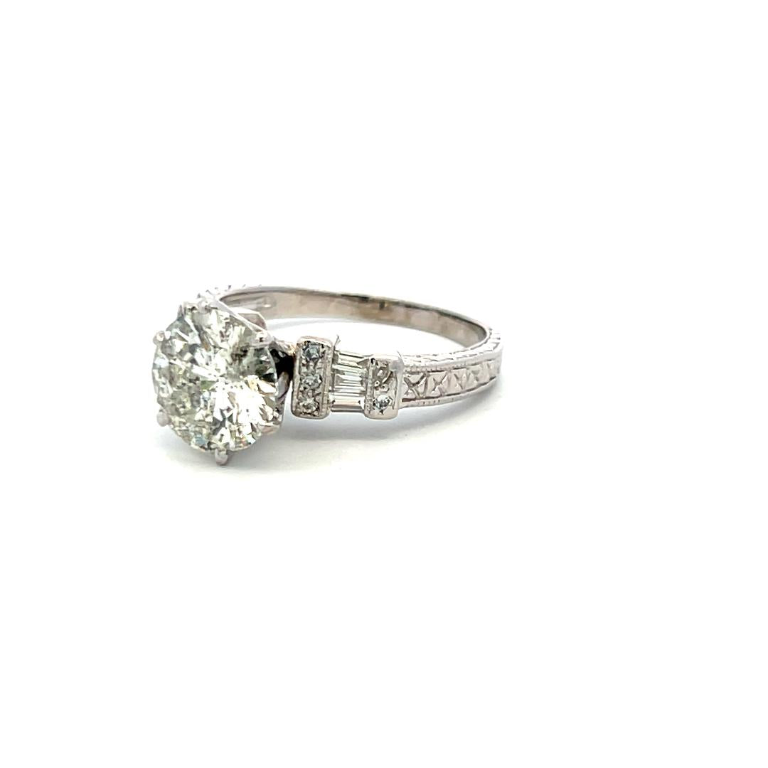 3.71 Carat Round and Tapered Baguette Diamond Platinum Engagement Ring
