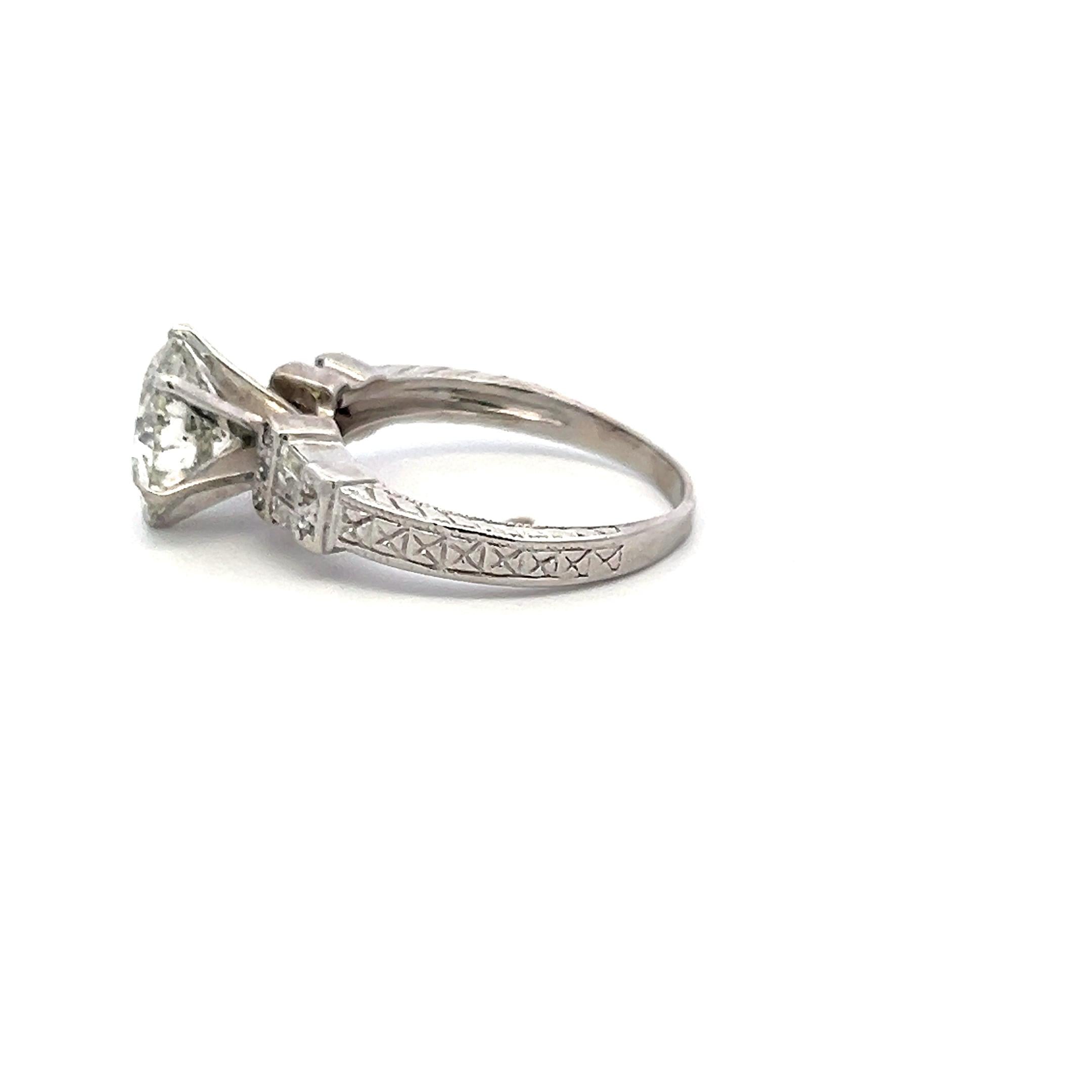 3.71 Carat Round and Tapered Baguette Diamond Platinum Engagement Ring