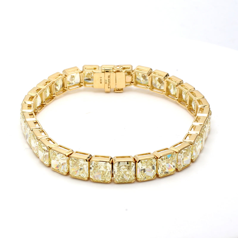 7.06 Carat Radiant Cut Fancy light yellow Diamond 18K Yellow Gold Tennis Bracelet