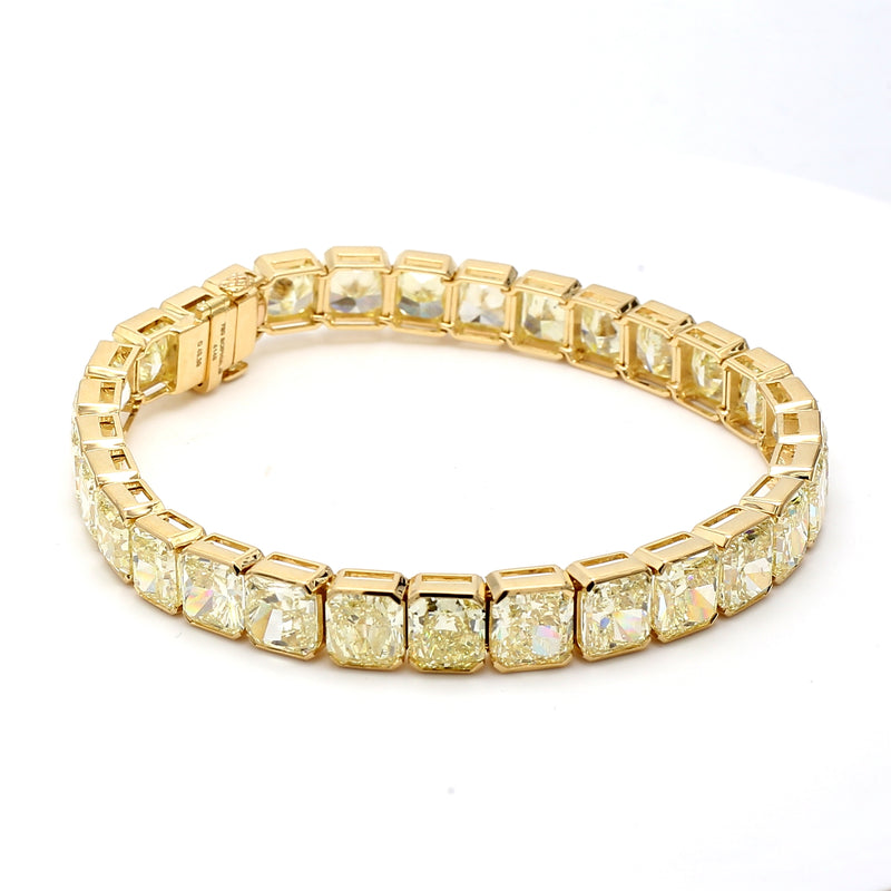 7.06 Carat Radiant Cut Fancy light yellow Diamond 18K Yellow Gold Tennis Bracelet
