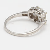 1.25 Carat Emerald Cut and Baguette Shape Diamond Platinum Three-Stone Ring