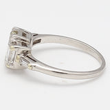 1.25 Carat Emerald Cut and Baguette Shape Diamond Platinum Three-Stone Ring