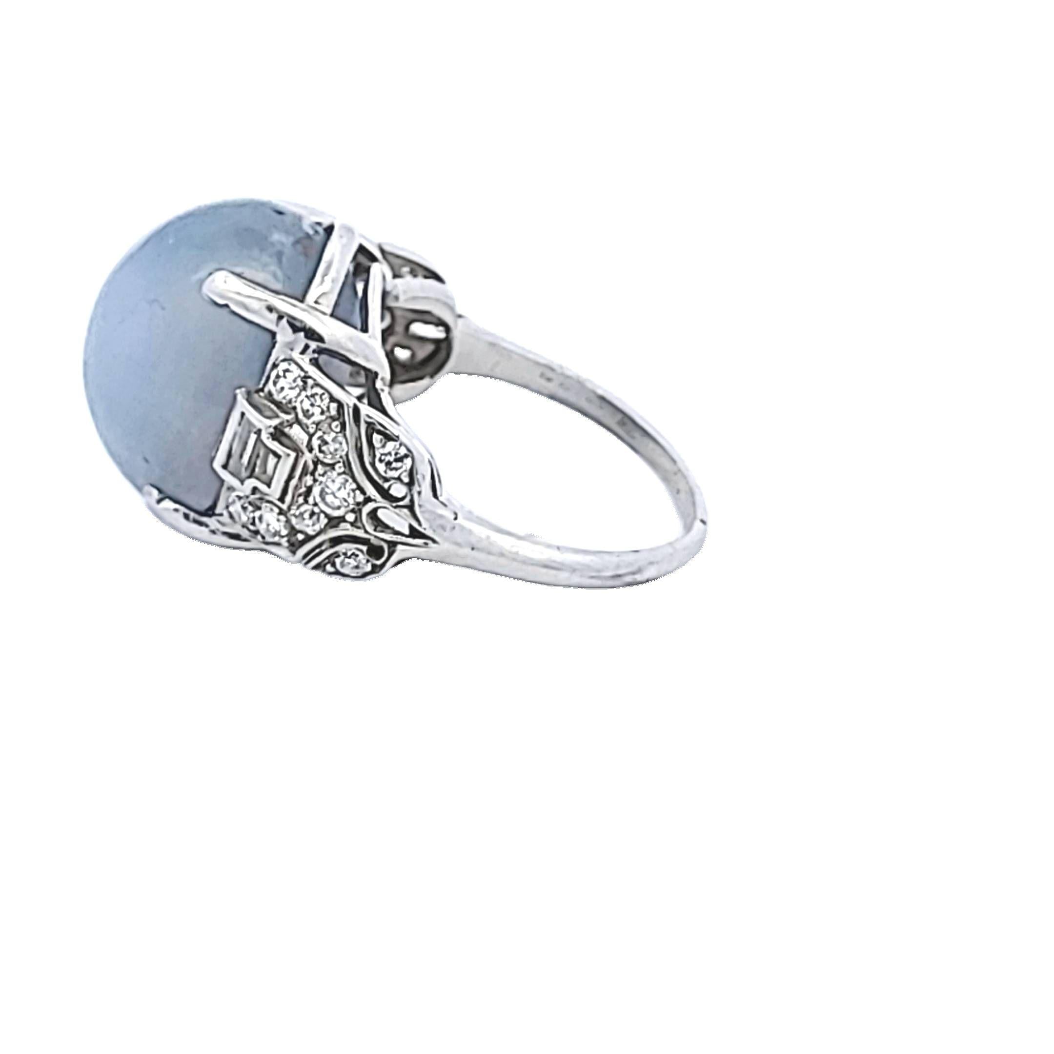 Platinum Gemstone Ring with 0.5 Ct Diamonds and 20 Ct Star Sapphire