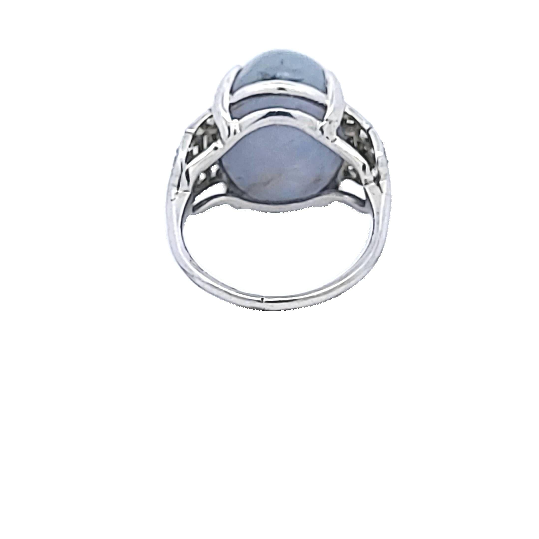 Platinum Gemstone Ring with 0.5 Ct Diamonds and 20 Ct Star Sapphire