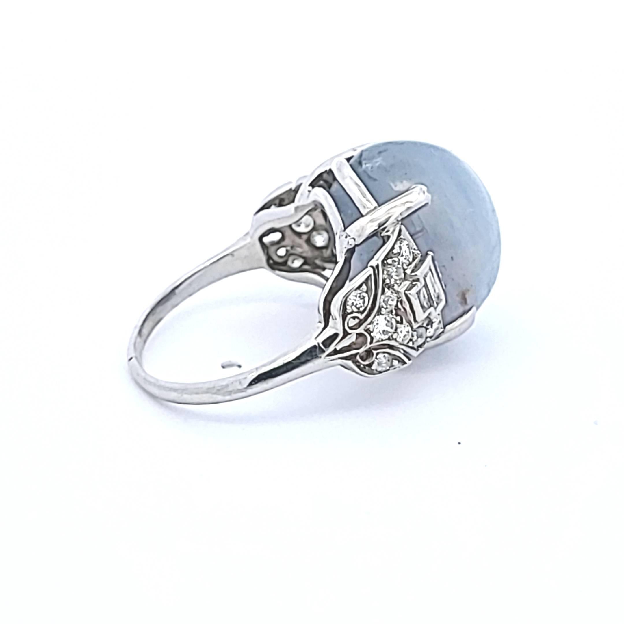 Platinum Gemstone Ring with 0.5 Ct Diamonds and 20 Ct Star Sapphire