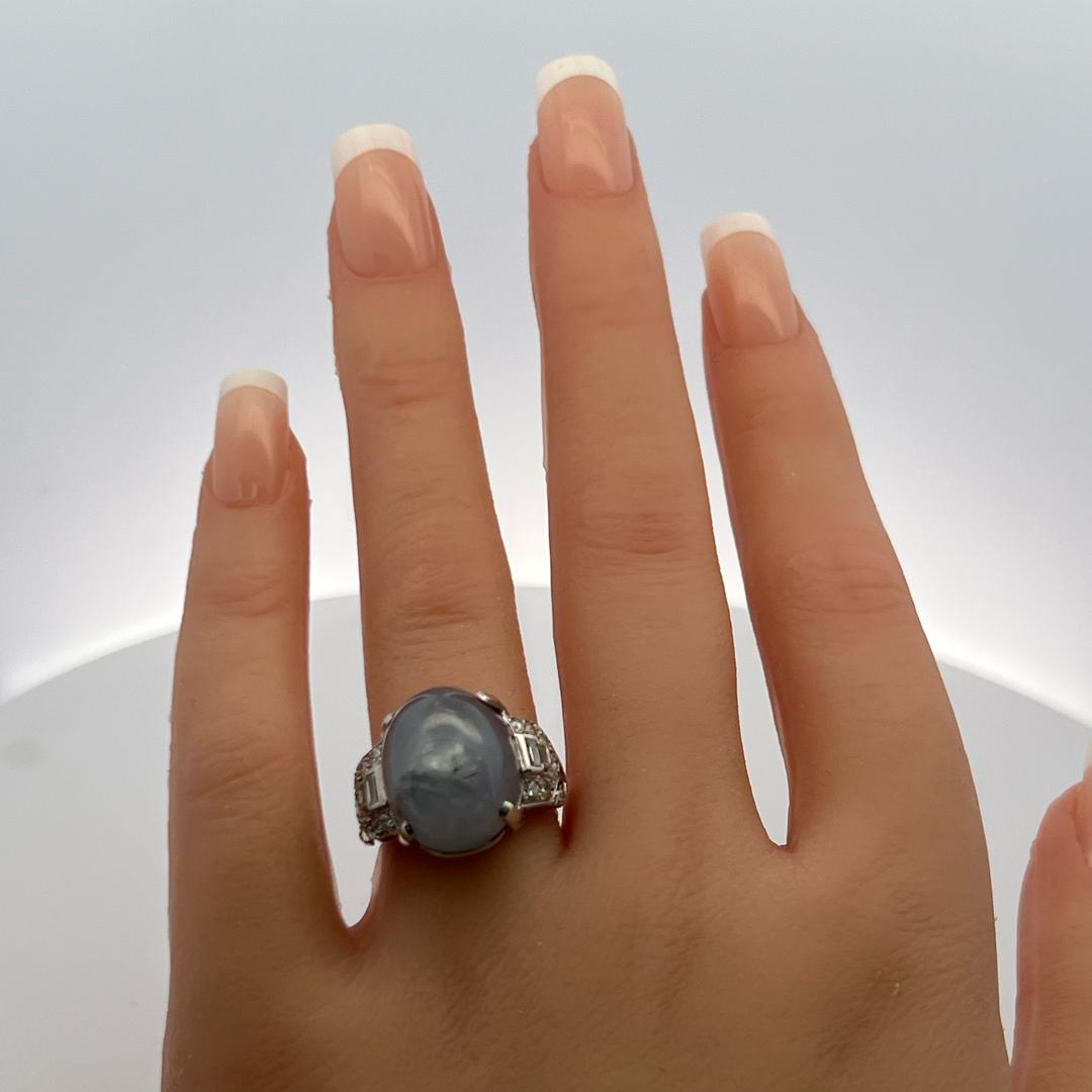 Platinum Gemstone Ring with 0.5 Ct Diamonds and 20 Ct Star Sapphire