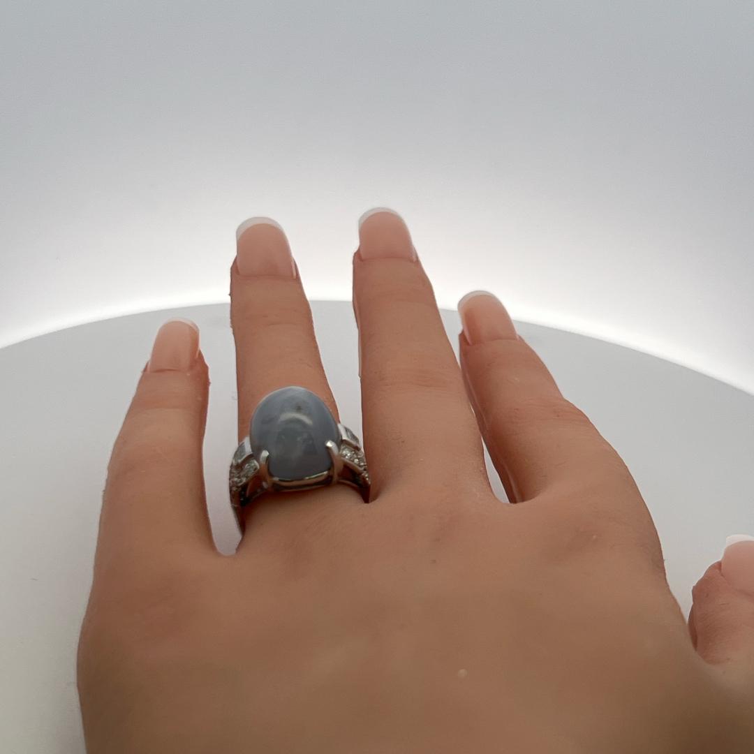 Platinum Gemstone Ring with 0.5 Ct Diamonds and 20 Ct Star Sapphire