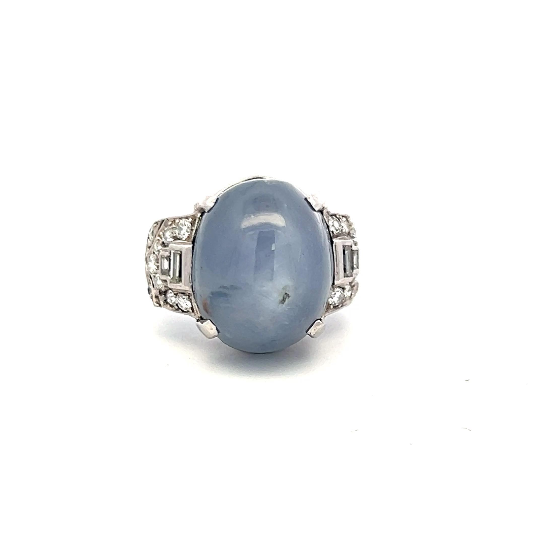 Platinum Gemstone Ring with 0.5 Ct Diamonds and 20 Ct Star Sapphire