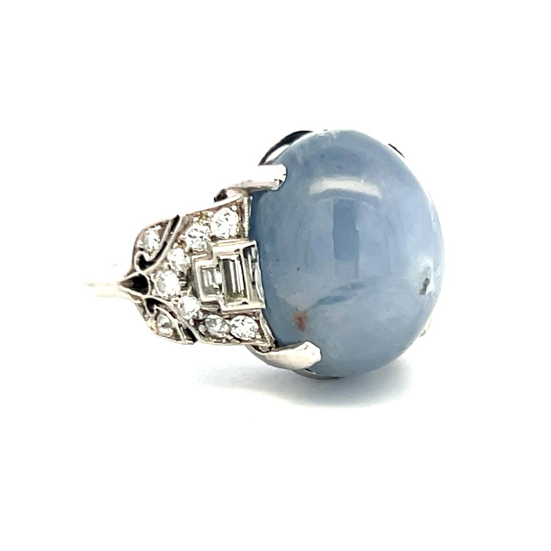 Platinum Gemstone Ring with 0.5 Ct Diamonds and 20 Ct Star Sapphire