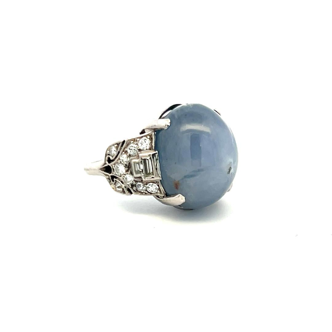 Platinum Gemstone Ring with 0.5 Ct Diamonds and 20 Ct Star Sapphire