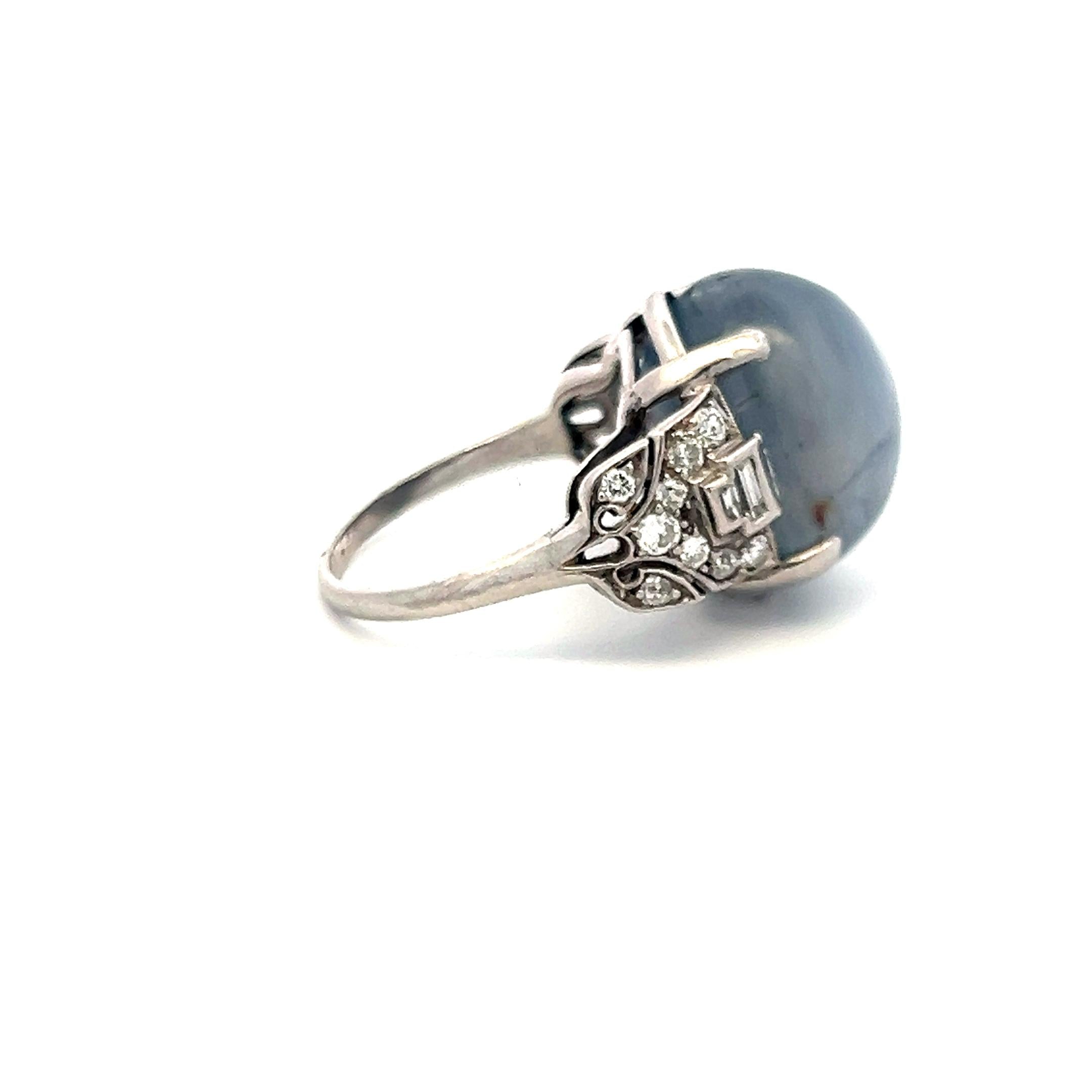 Platinum Gemstone Ring with 0.5 Ct Diamonds and 20 Ct Star Sapphire