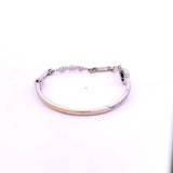 0.40 Carat Oval Shape Sapphire 0.22 Carat Round J-I2 Diamond 18 Karat Yellow Gold Bangle Bracelet