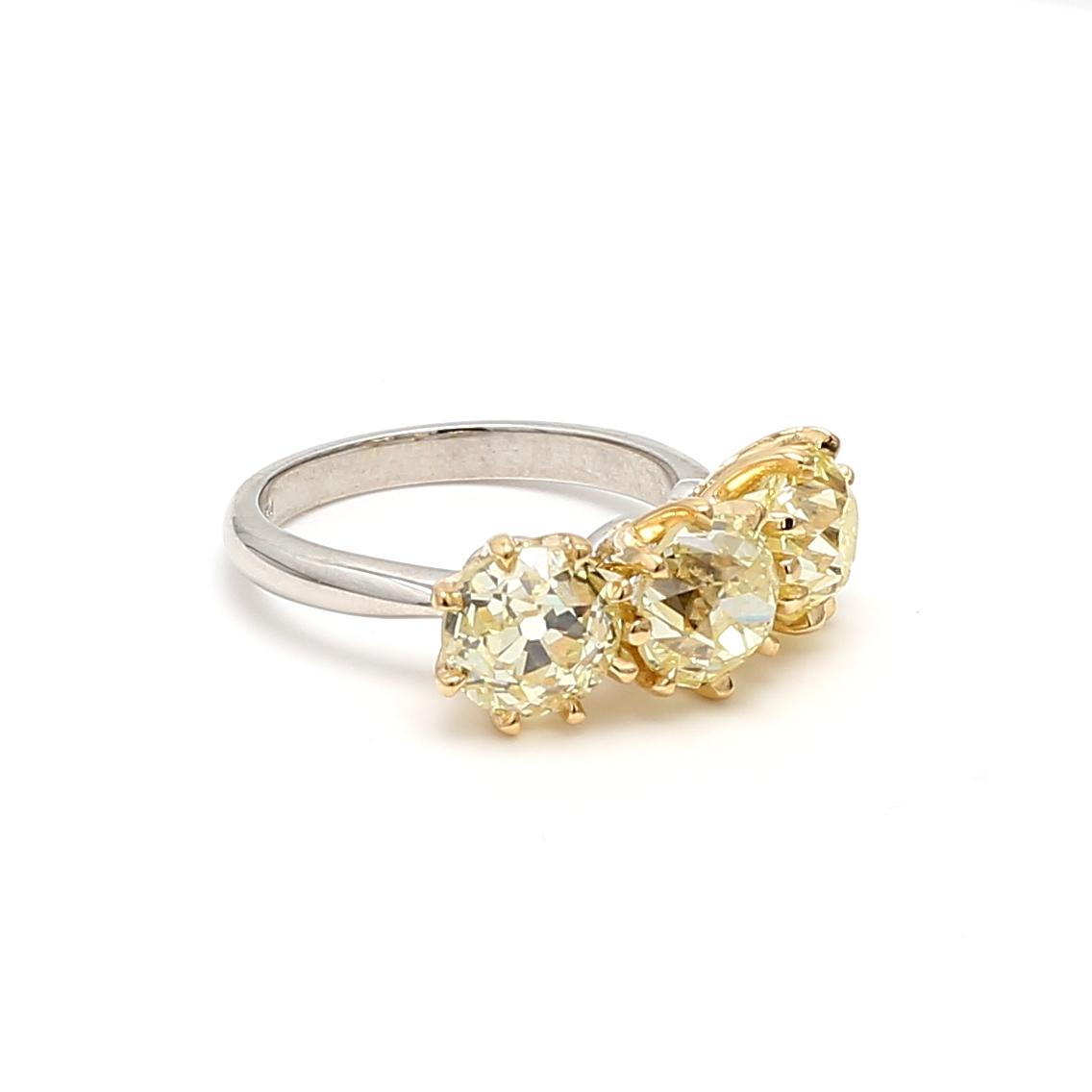 5.59ct Fancy Light Yellow Old European Cut Diamond Three-Stone 18K Gold Ring