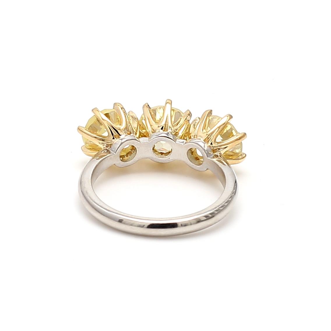 5.59ct Fancy Light Yellow Old European Cut Diamond Three-Stone 18K Gold Ring