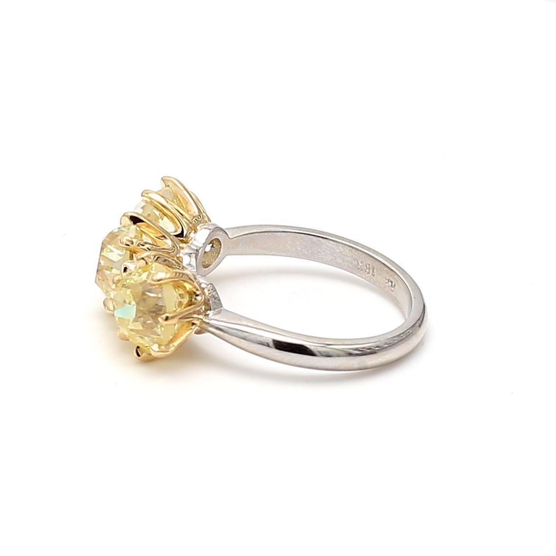 5.59ct Fancy Light Yellow Old European Cut Diamond Three-Stone 18K Gold Ring