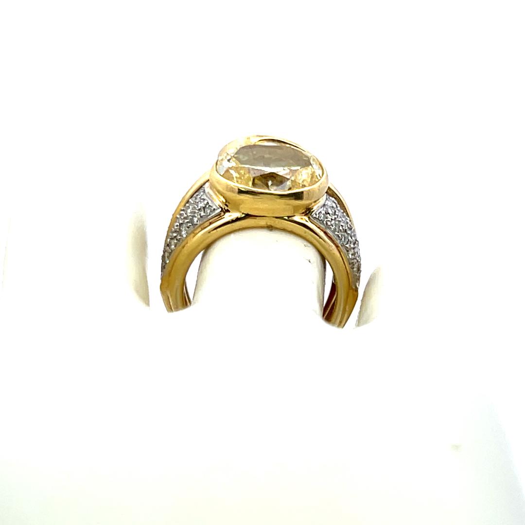 18K YG Two-Stone Ring with 8.27ct Fancy Yellow Oval and White Round Diamonds GIA