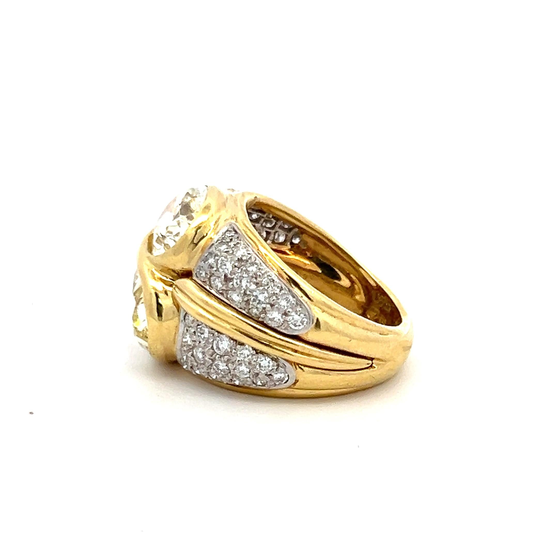18K YG Two-Stone Ring with 8.27ct Fancy Yellow Oval and White Round Diamonds GIA