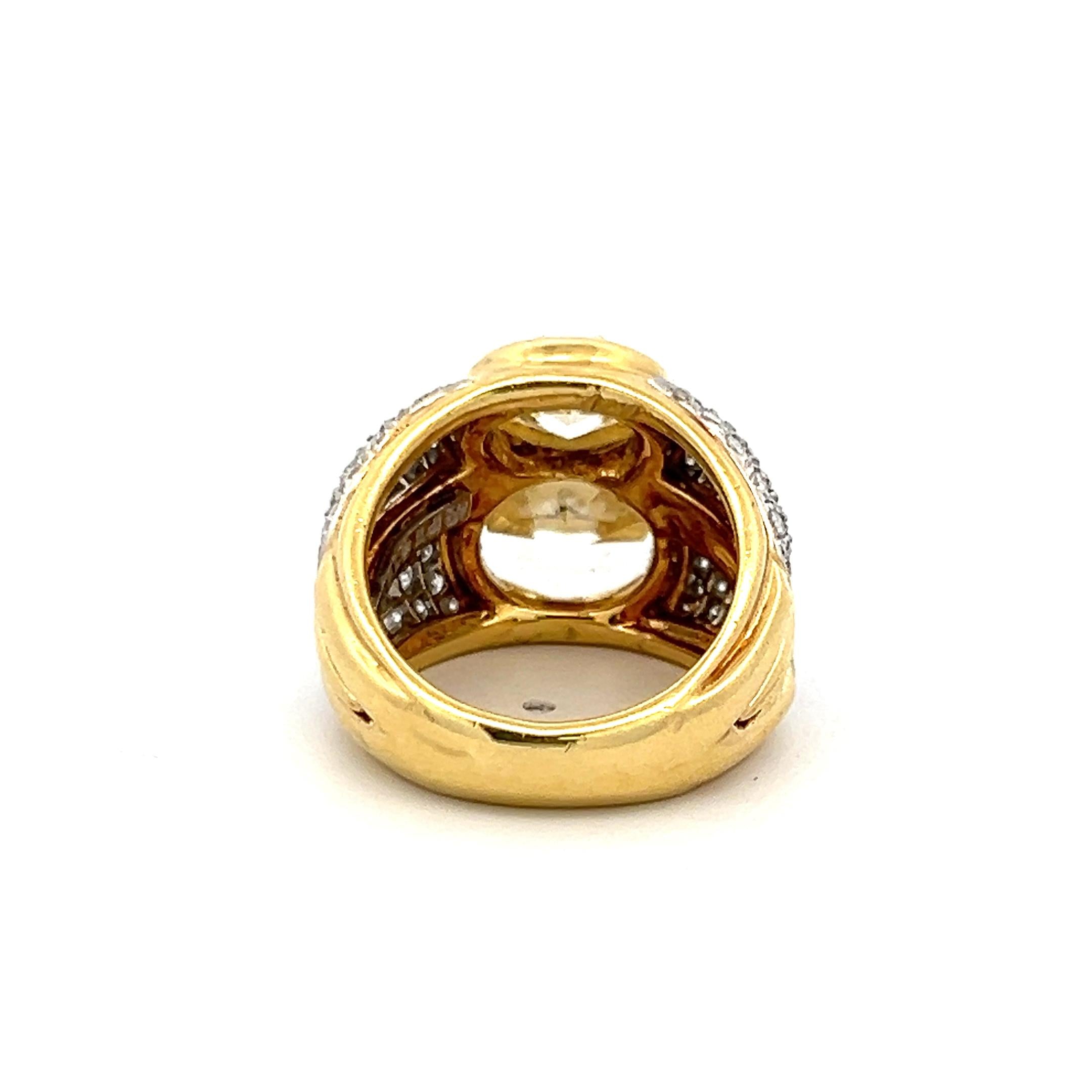 18K YG Two-Stone Ring with 8.27ct Fancy Yellow Oval and White Round Diamonds GIA