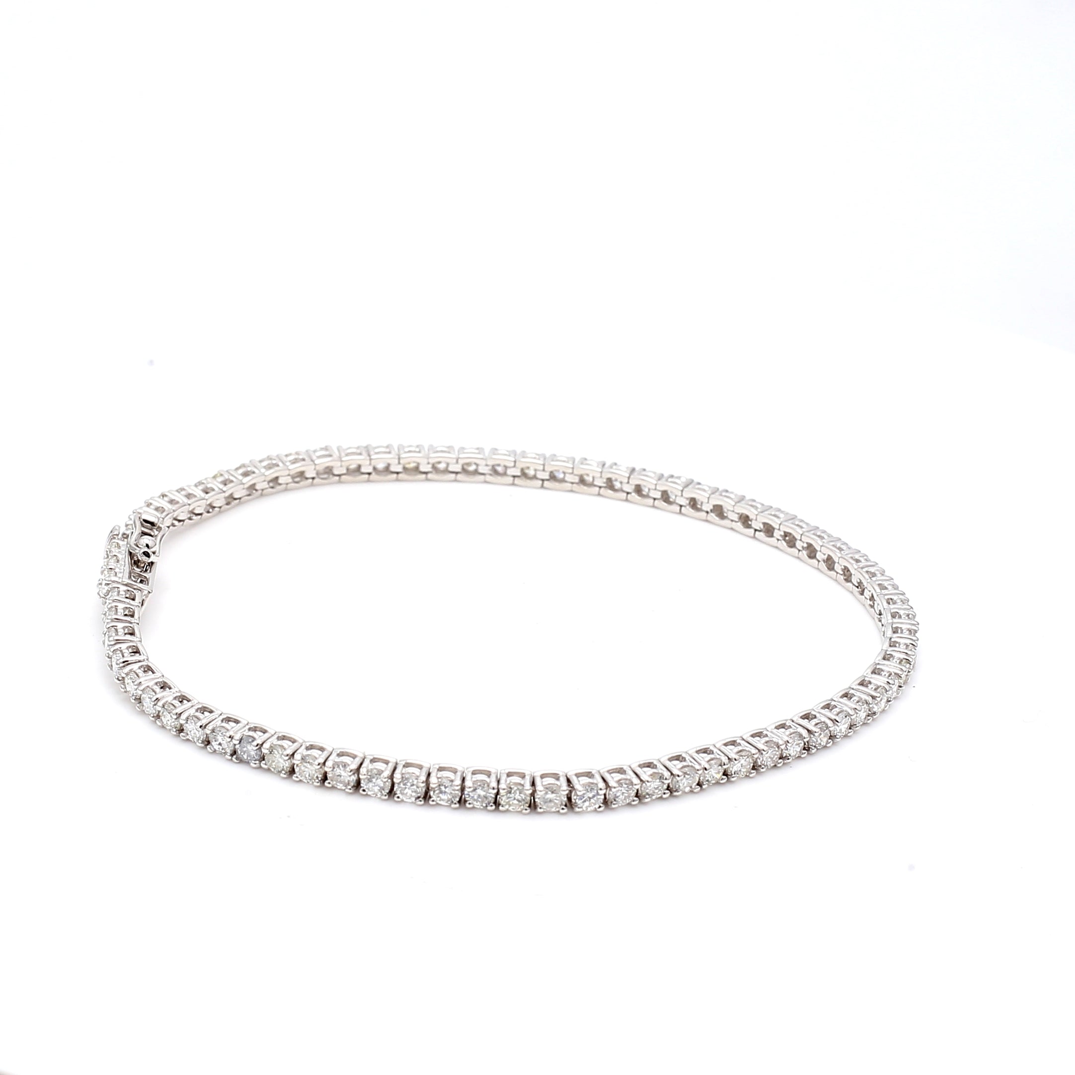3.01 Carat Round Brilliant F VS1 Diamond 14 Karat White Gold Tennis Bracelet