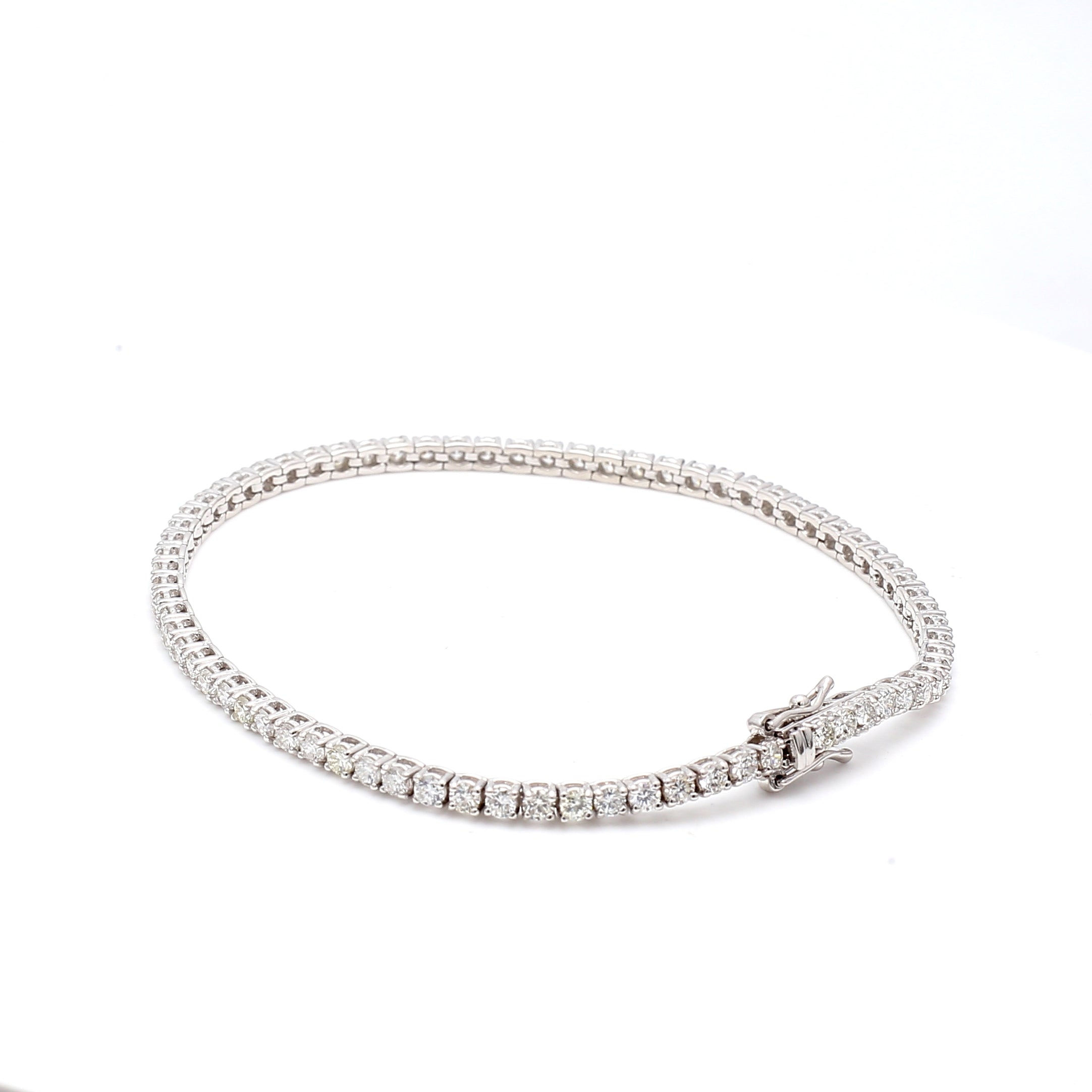 3.01 Carat Round Brilliant F VS1 Diamond 14 Karat White Gold Tennis Bracelet
