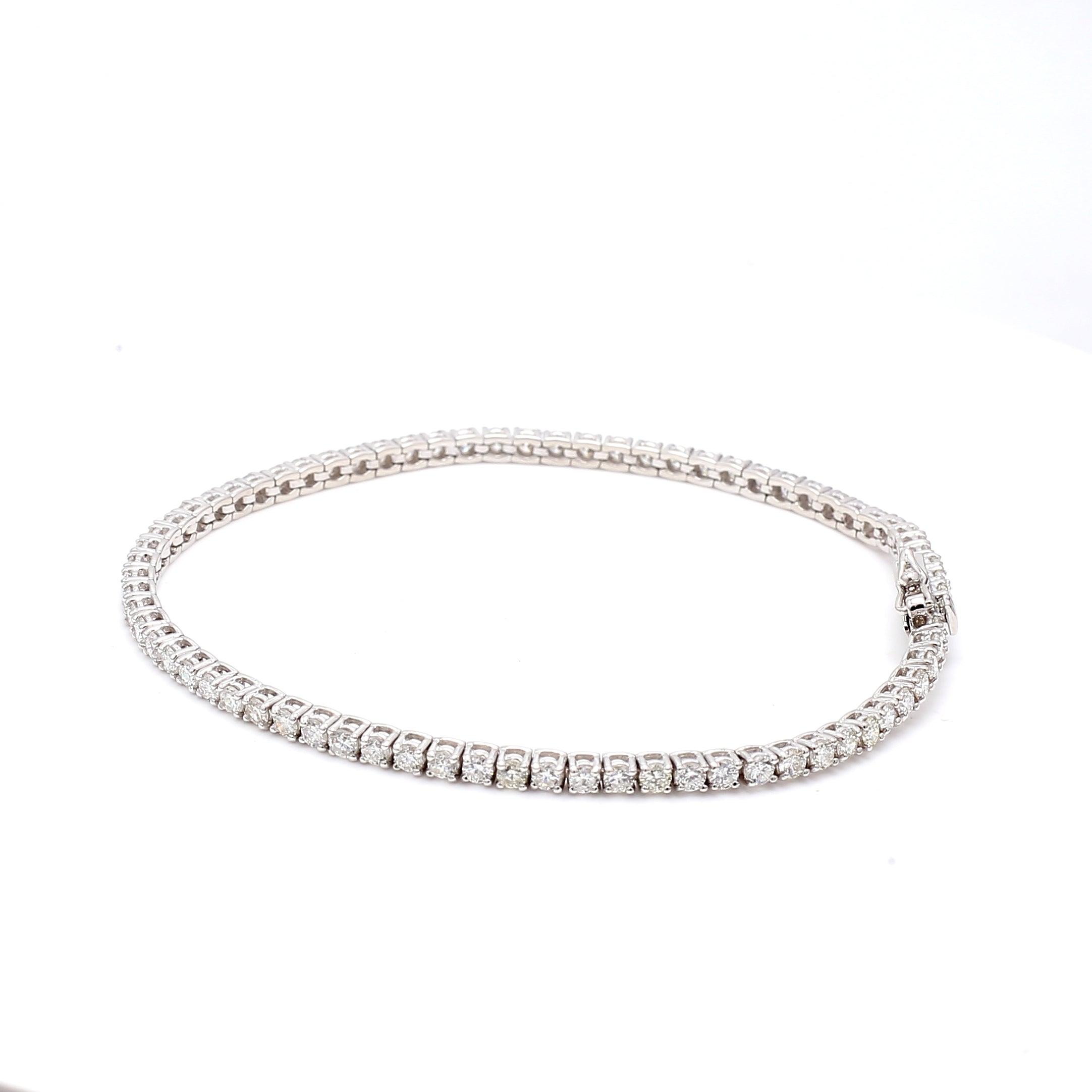 3.01 Carat Round Brilliant F VS1 Diamond 14 Karat White Gold Tennis Bracelet
