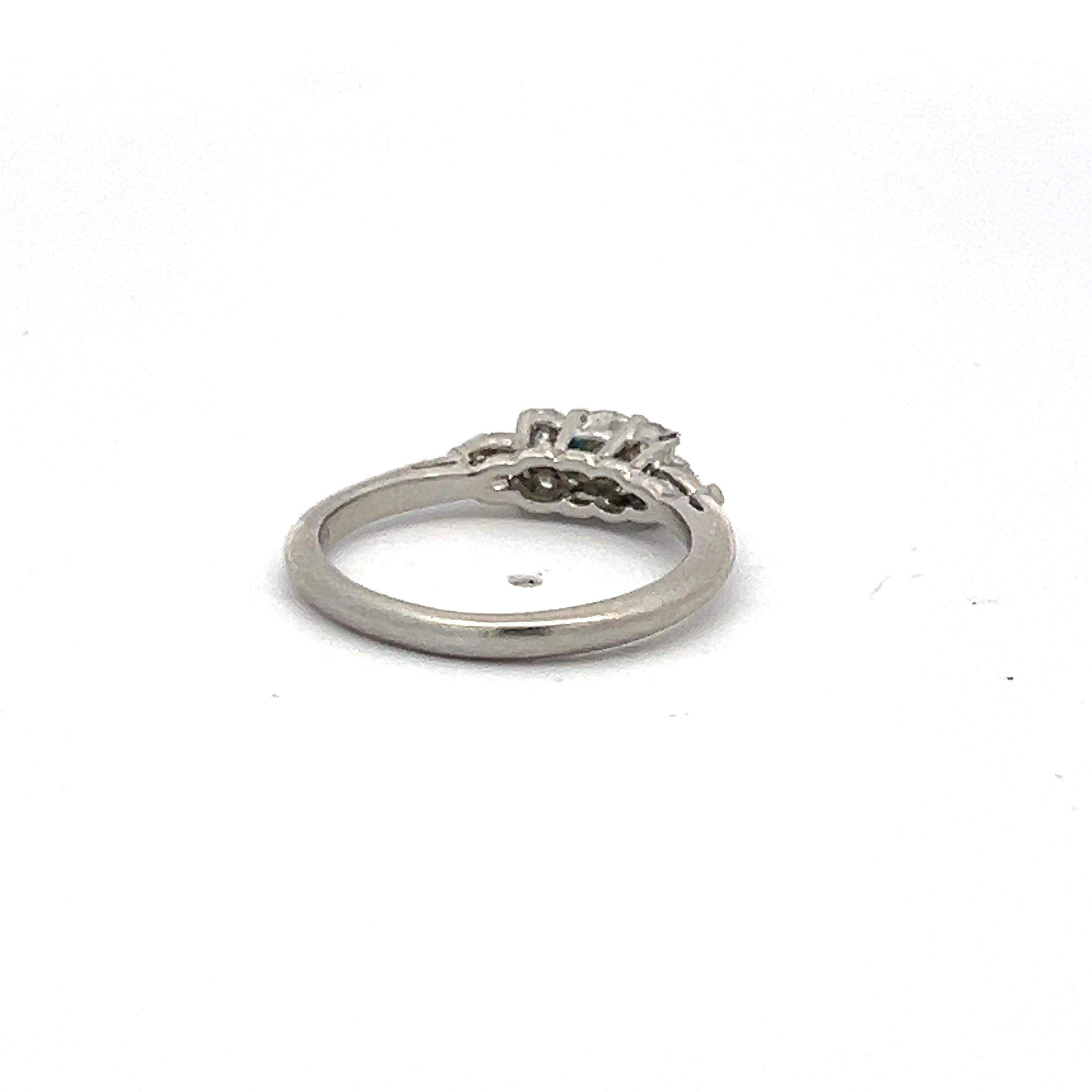 Tiffany & Co 0.52 Carat Round Brilliant and Pear Shape Diamond Platinum Engagement Ring