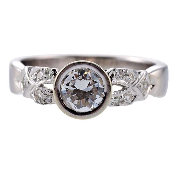 0.65 Carat Round Brilliant I I1-SI1 Diamond 14 Karat White Gold Halo Ring