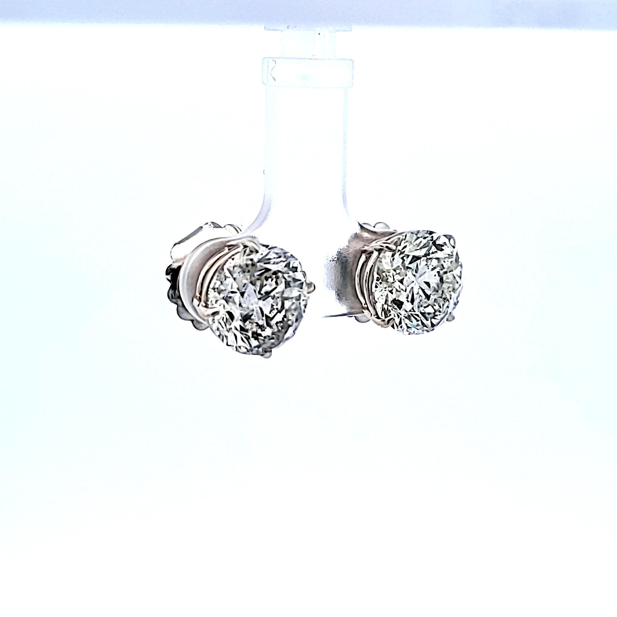 Platinum Stud Earrings with 8.01 Carat Round Diamonds FAG- I2 GIA