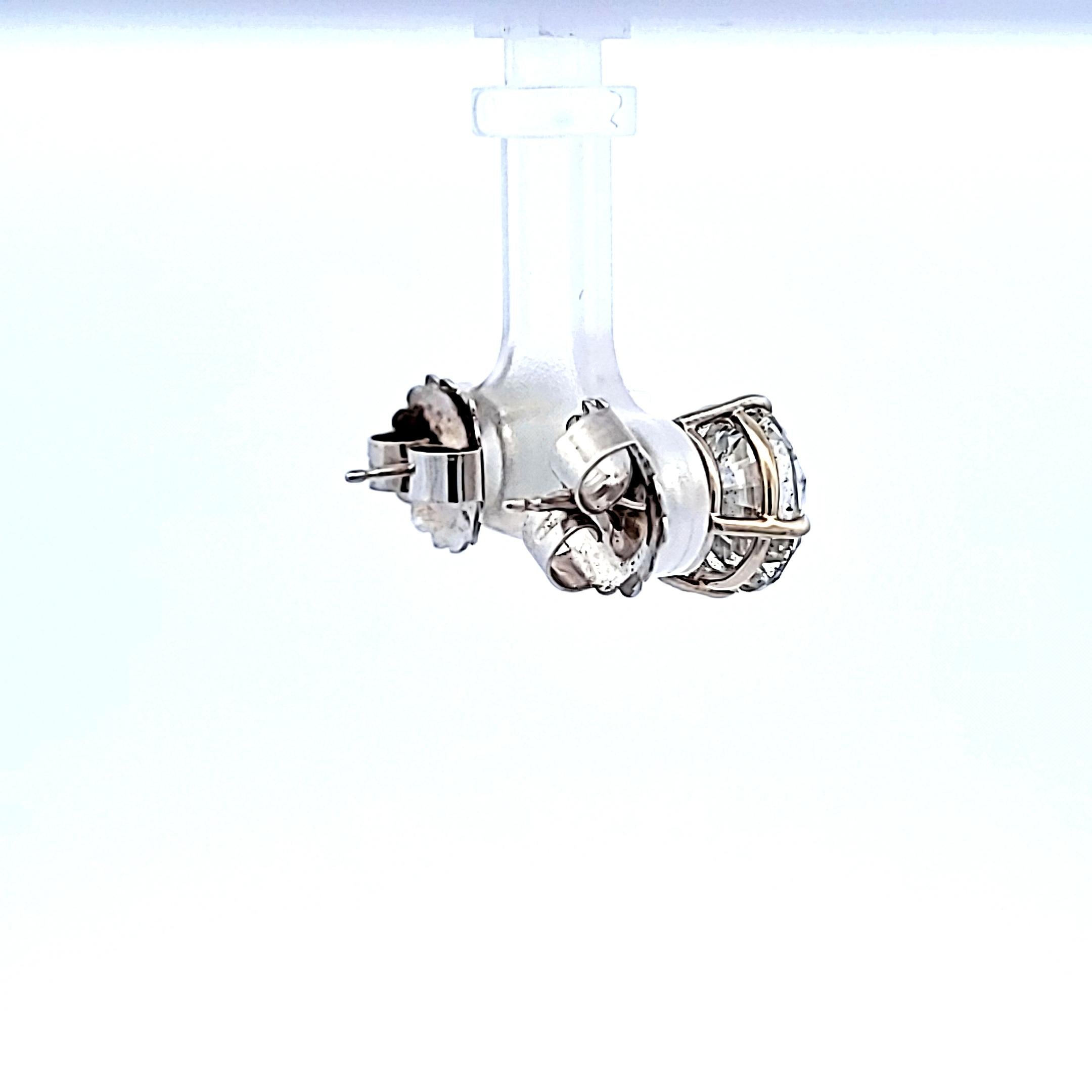 Platinum Stud Earrings with 8.01 Carat Round Diamonds FAG- I2 GIA