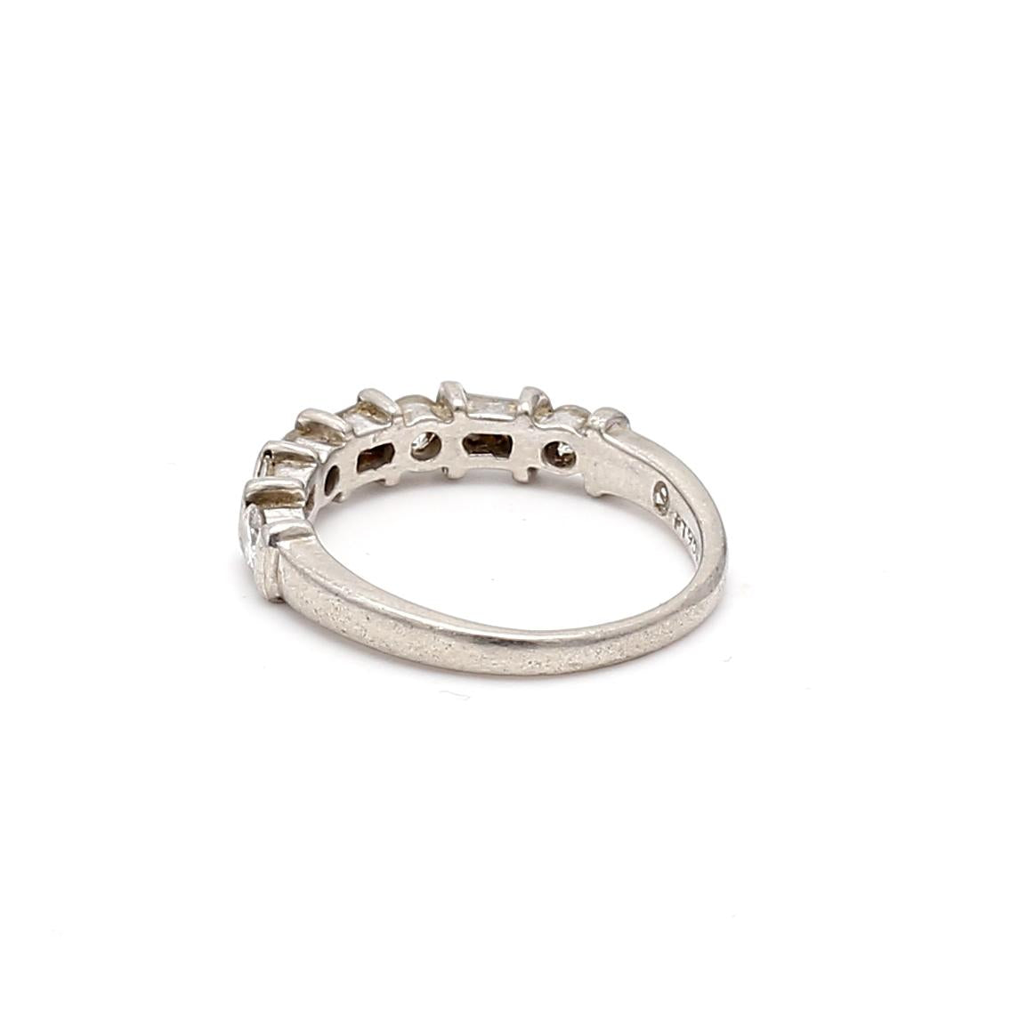 0.76 Carat Round Brilliant H SI1 and Baguette Shape H SI2 Diamond Platinum Band