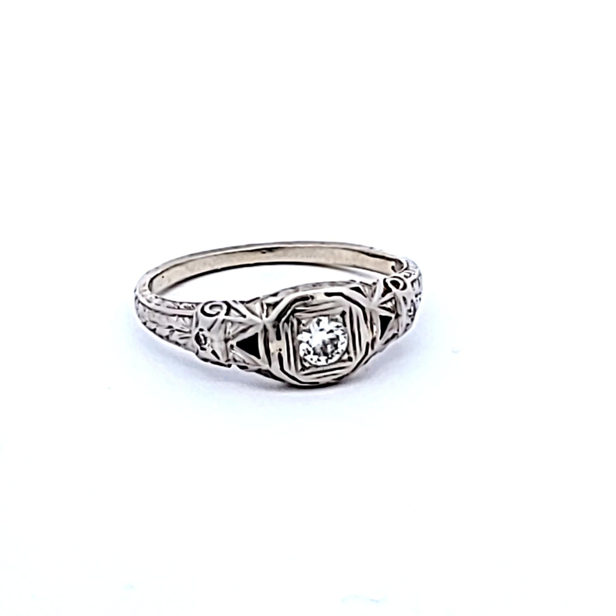 Art Deco Platinum Ring with 0.25ct Old European Cut Diamond and 0.04ct Sapphire