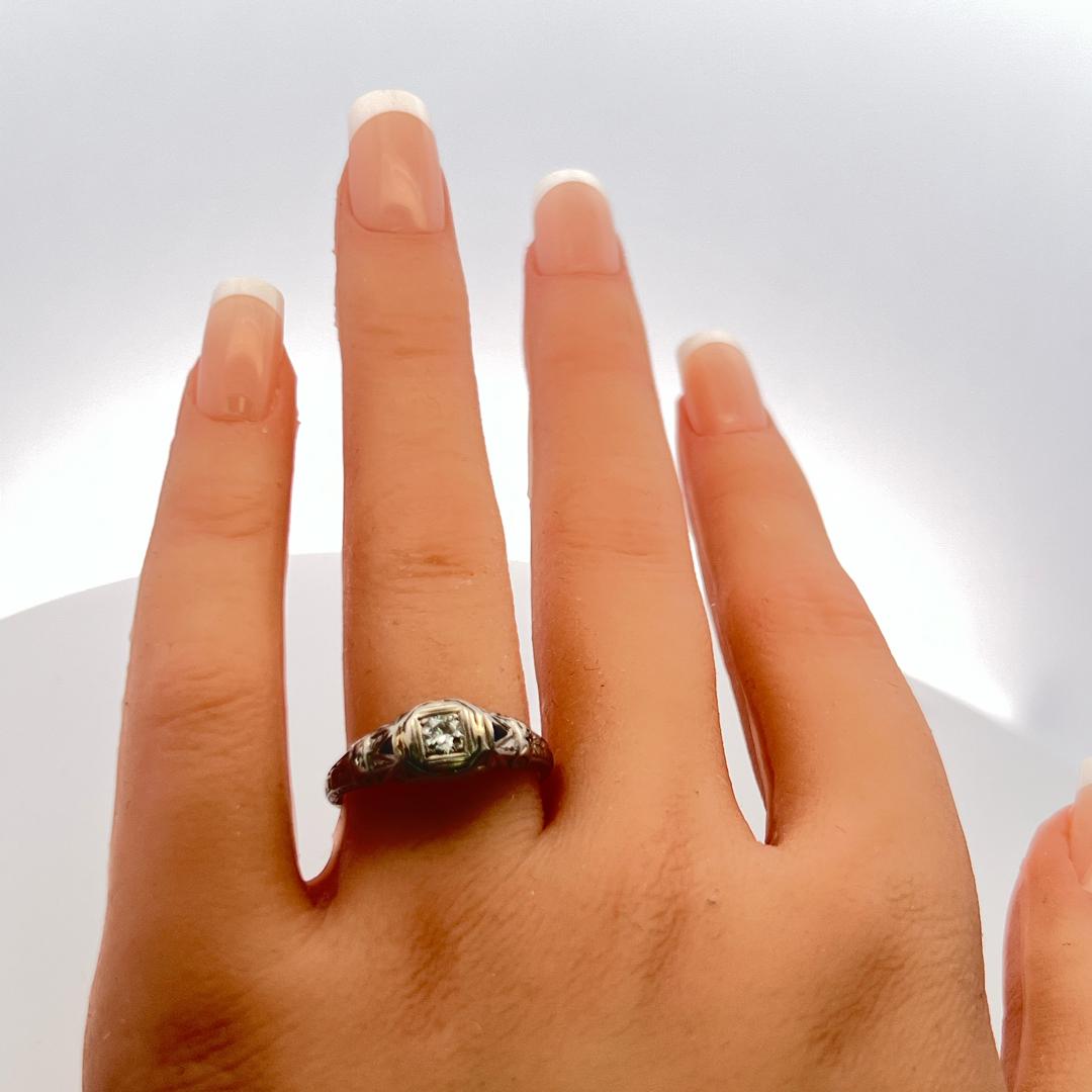 Art Deco Platinum Ring with 0.25ct Old European Cut Diamond and 0.04ct Sapphire